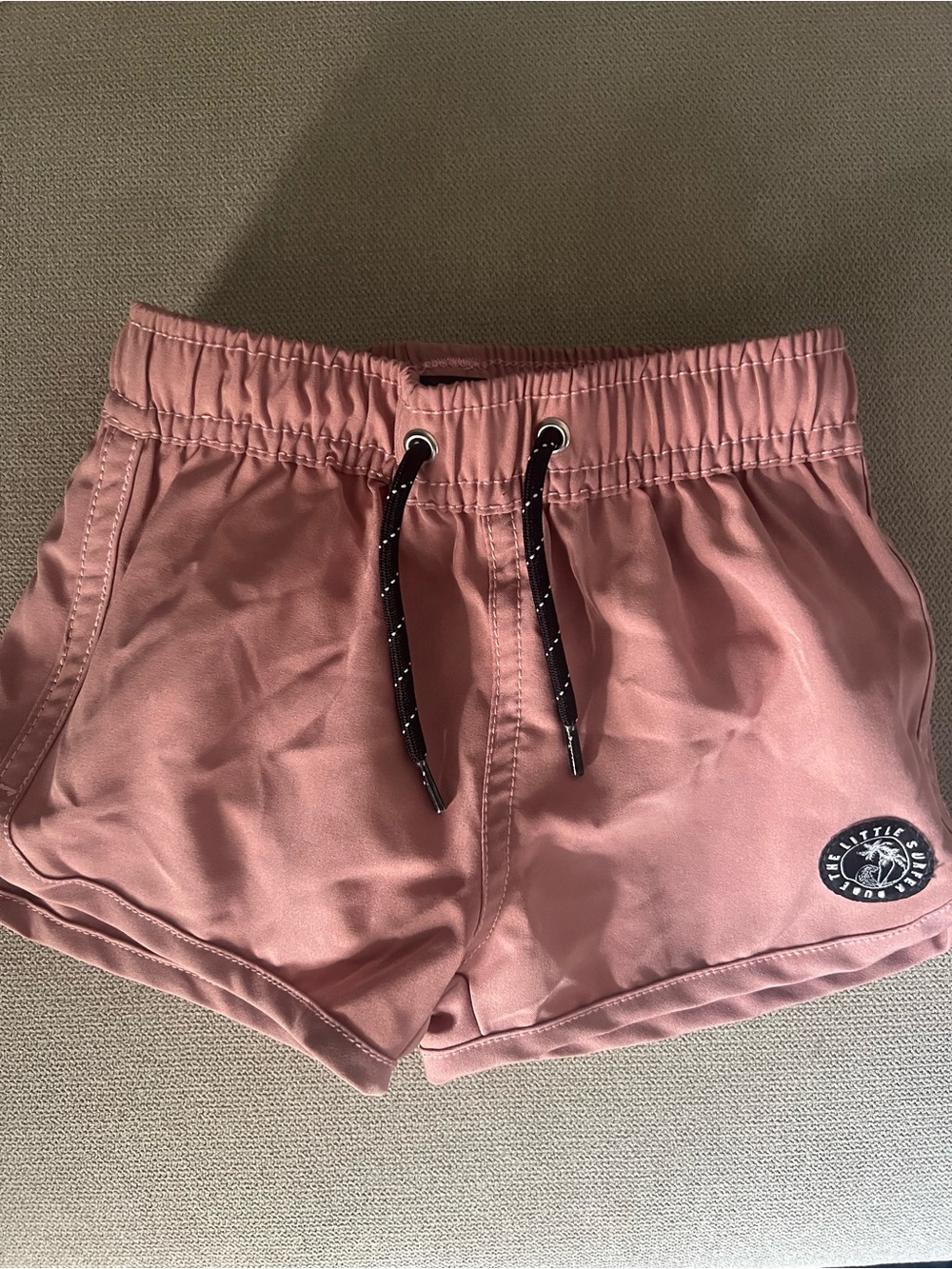 The Little Surfer Dude Swim Trunks in Dusty Rose